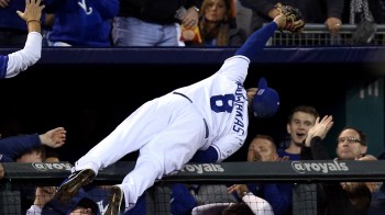 The Moose is loose: Mike Moustakas continues his storybook playoff run with an incredible catch into the stands at Kauffman Stadium in Kansas City.